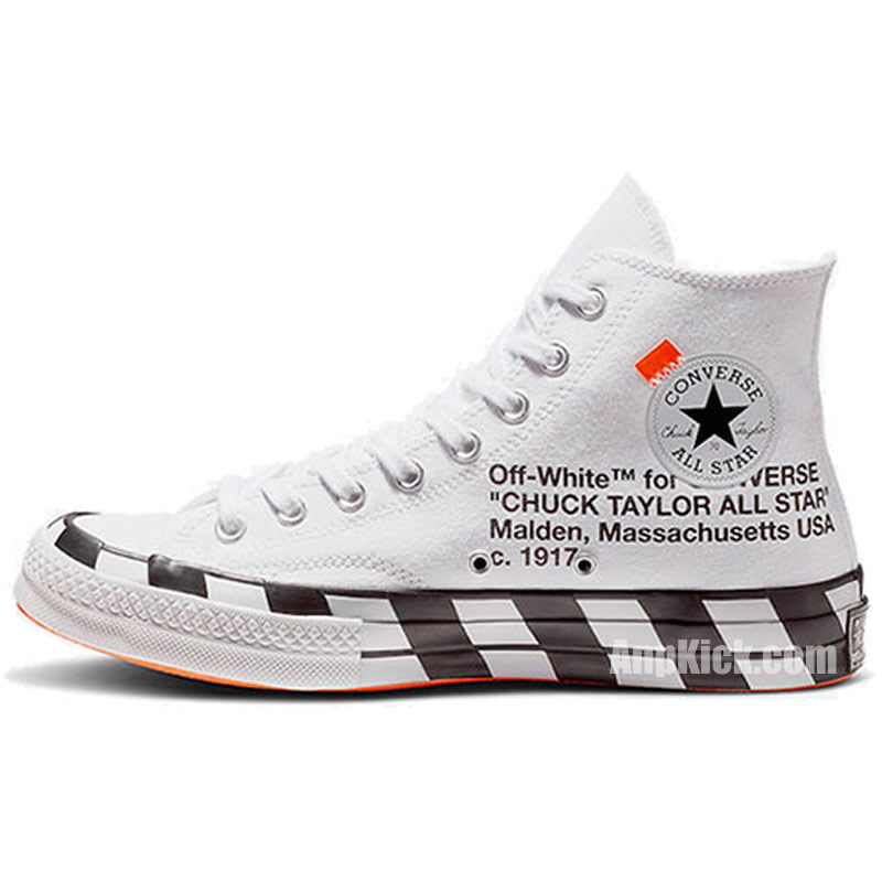 white converse with orange tag
